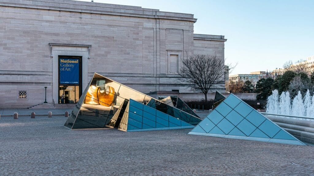 National Gallery of Art exterior with angular mirrored glass pyramid sculpture