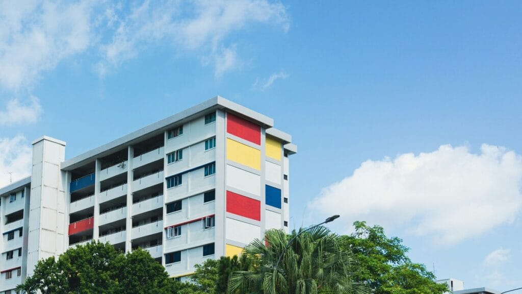 Curved modernist building with horizontal ribbed facade — Bauhaus architectural design