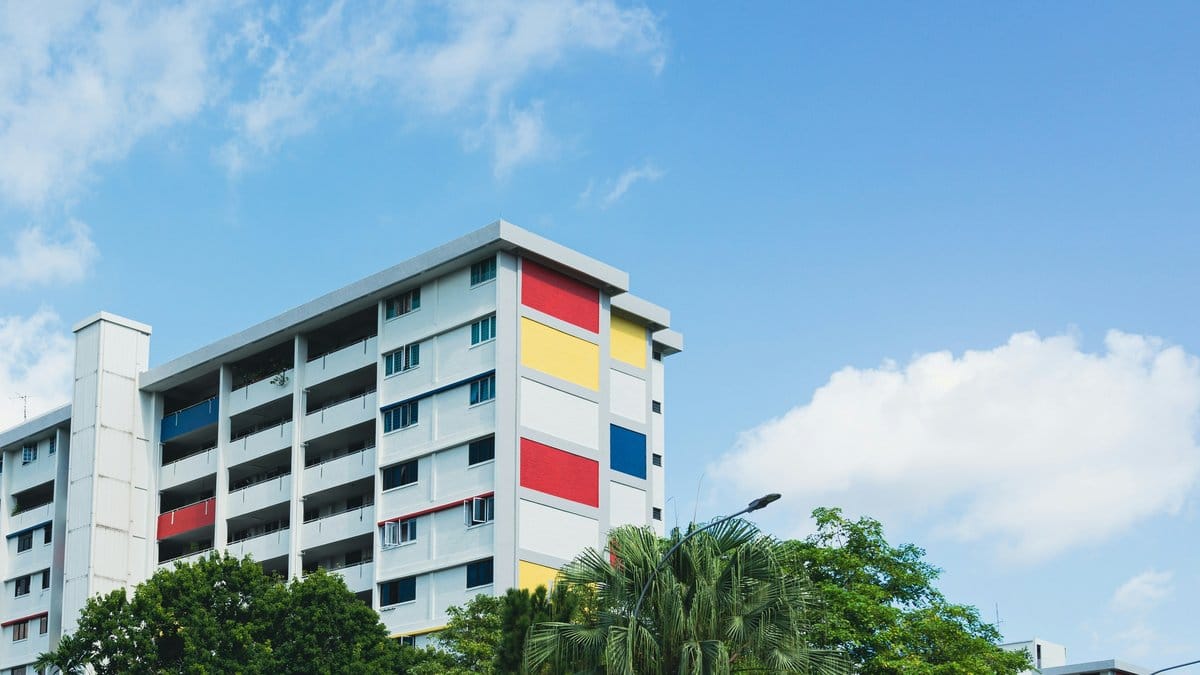 Curved modernist building with horizontal ribbed facade — Bauhaus architectural design
