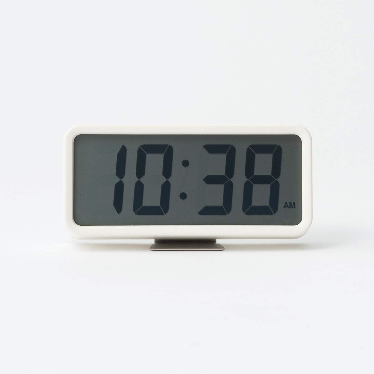 Braun alarm clock designed in the Dieter Rams tradition of functional, unobtrusive design