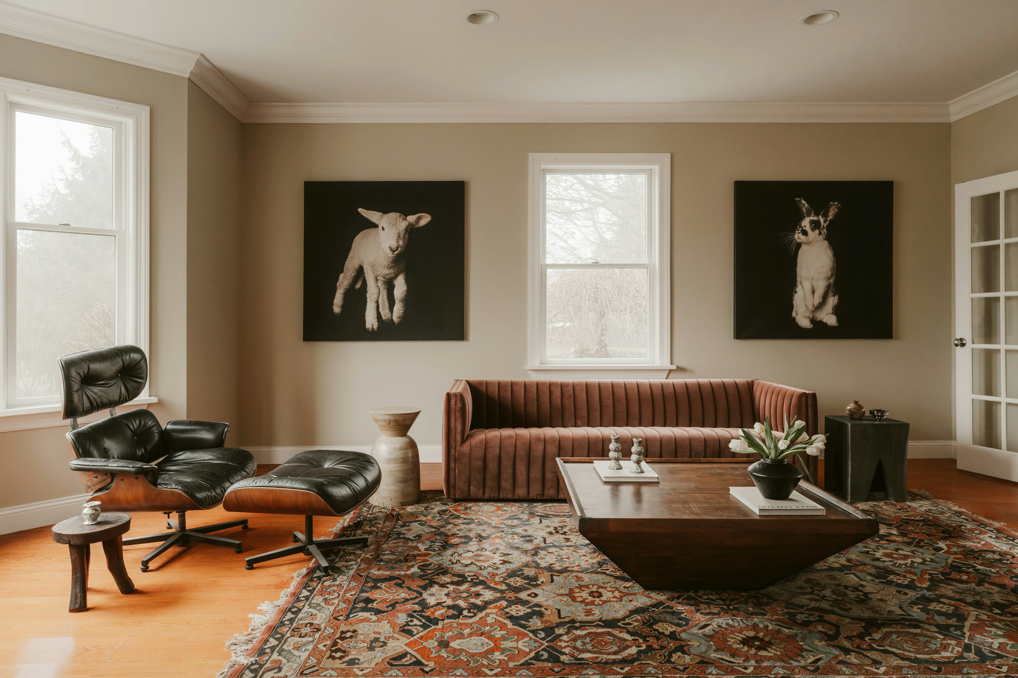 Eames Lounge Chair and ottoman in a mid-century modern living room setting