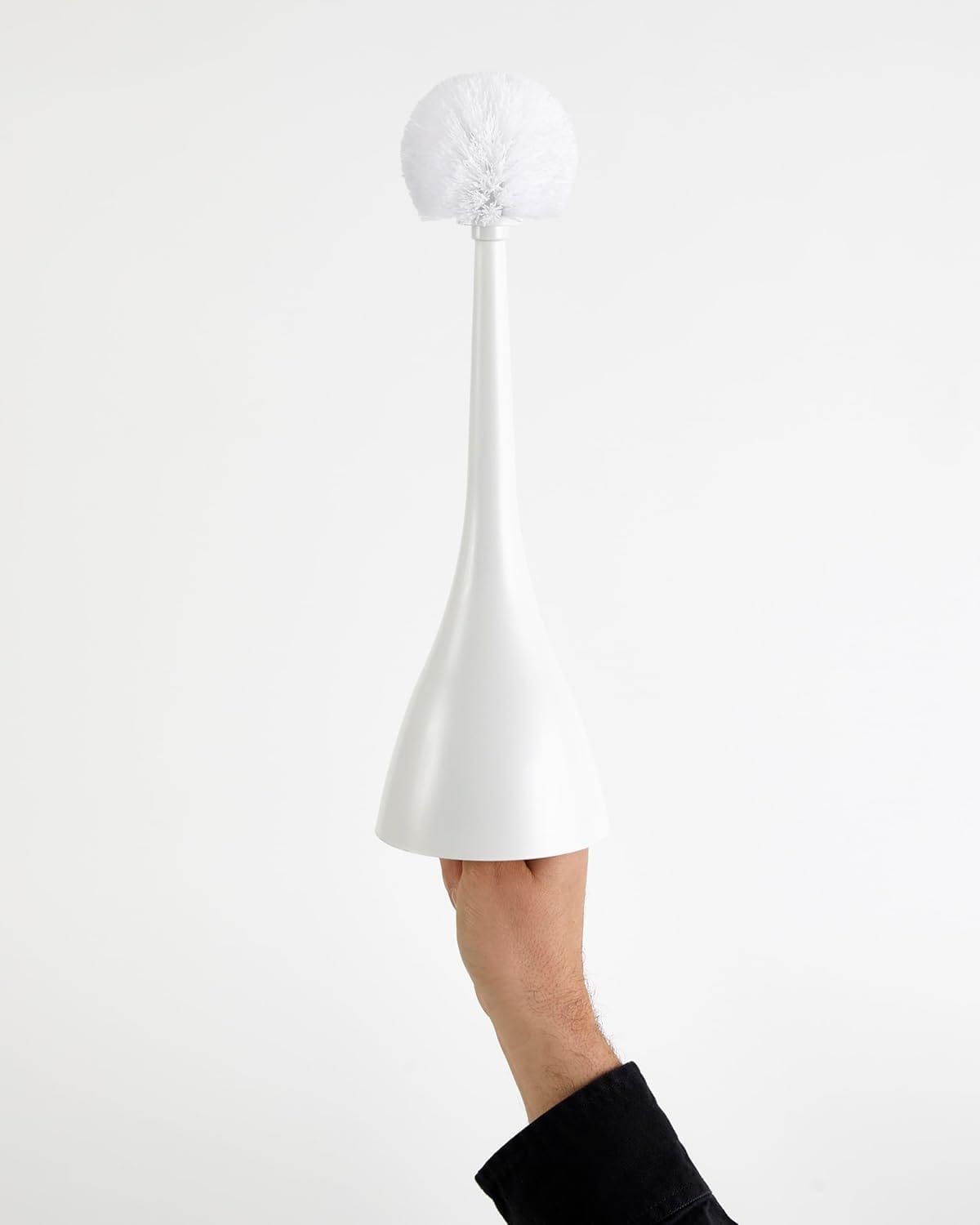 Heller Excalibur toilet brush by Philippe Starck shown in use