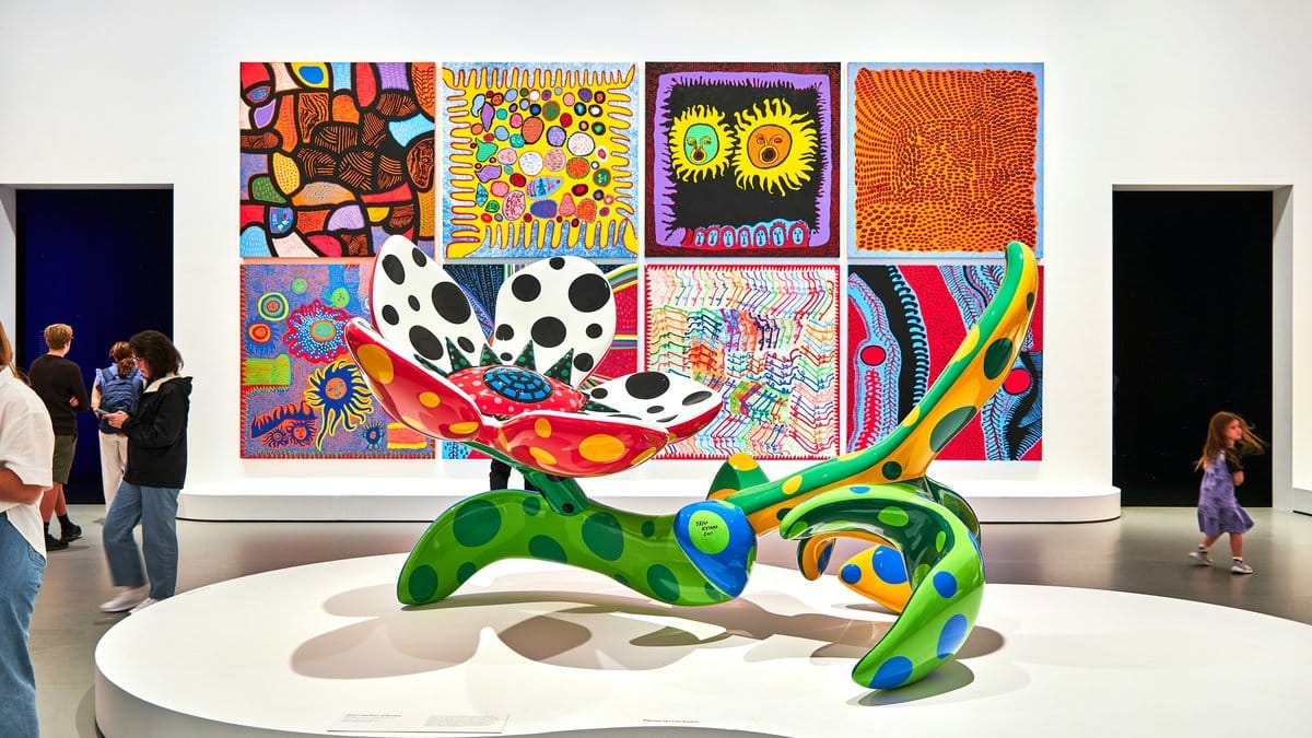 Yayoi Kusama exhibition with polka dot colorful sculpture and paintings