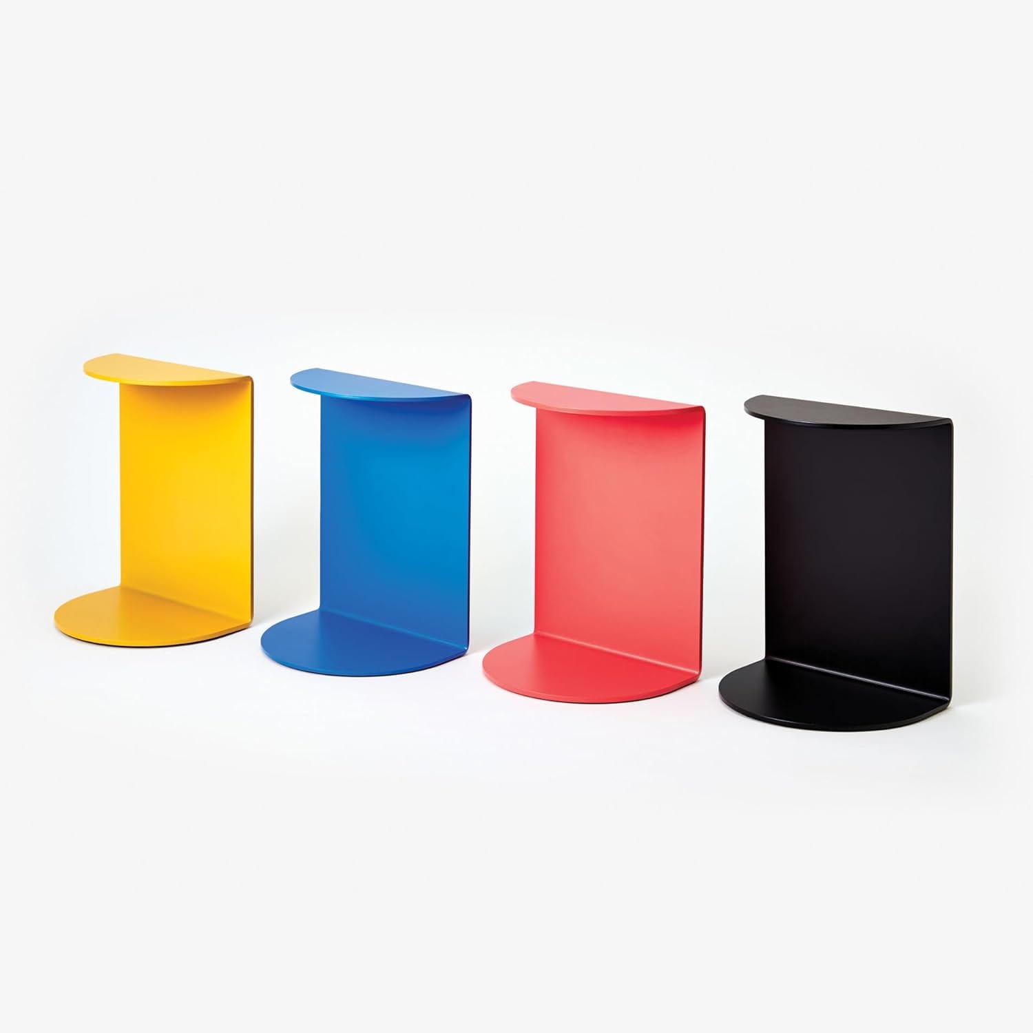 Areaware Reference Bookend in black powder-coated metal, showing the long bottom flange and rubber grip