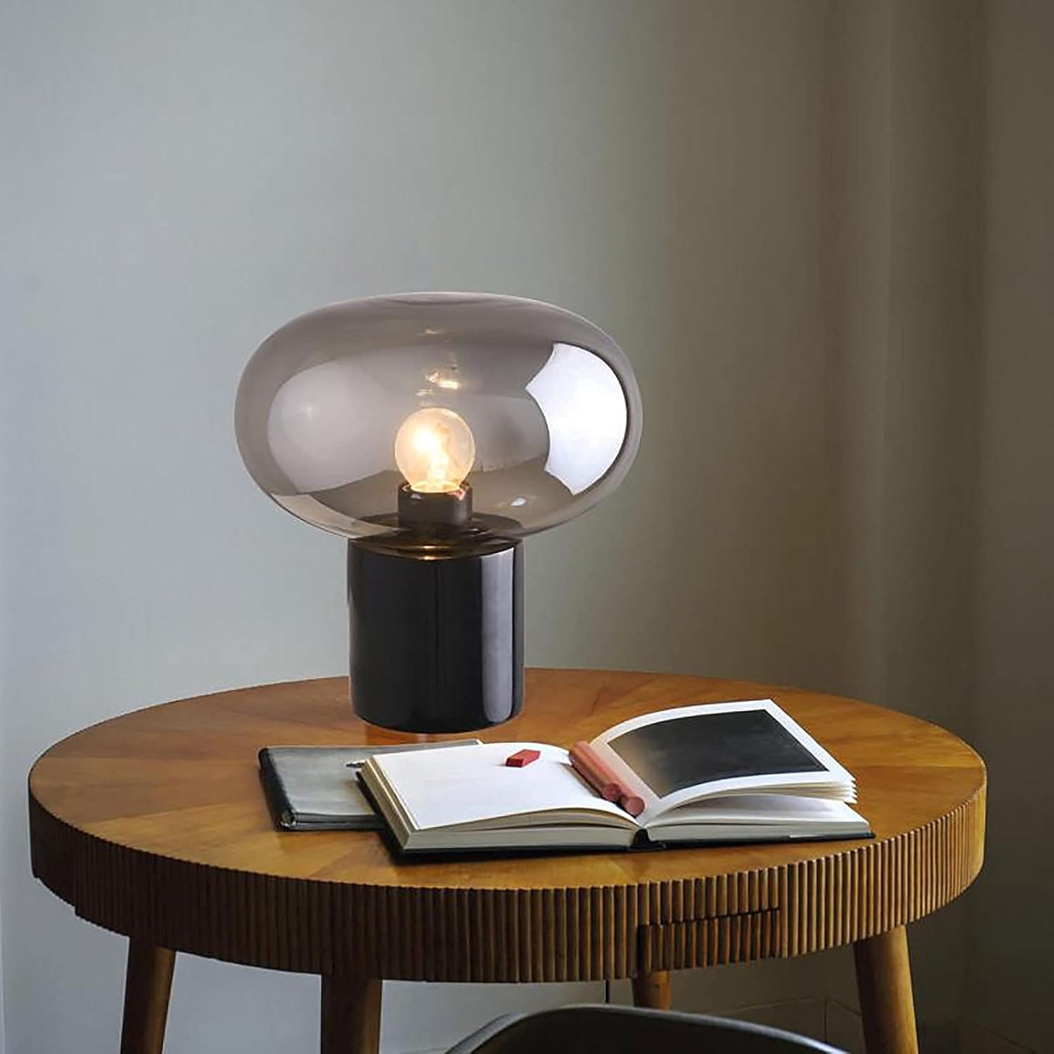 Poiaeusant smoky gray hand-blown glass table lamp with white marble base