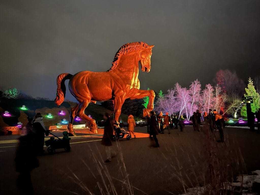 Nina Akamu, The American Horse, 1999, bronze, 24 feet, illuminated at night at Frederik Meijer Gardens, Grand Rapids, Michigan