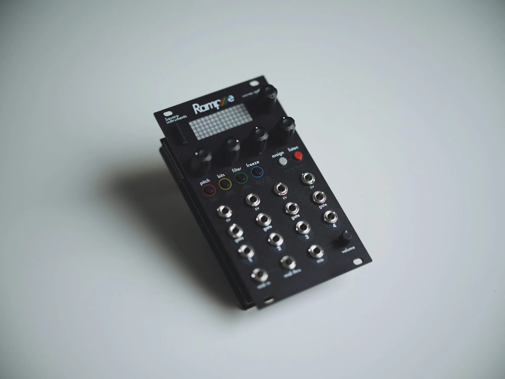 Electronic music instrument with knobs and controls showing minimal industrial design
