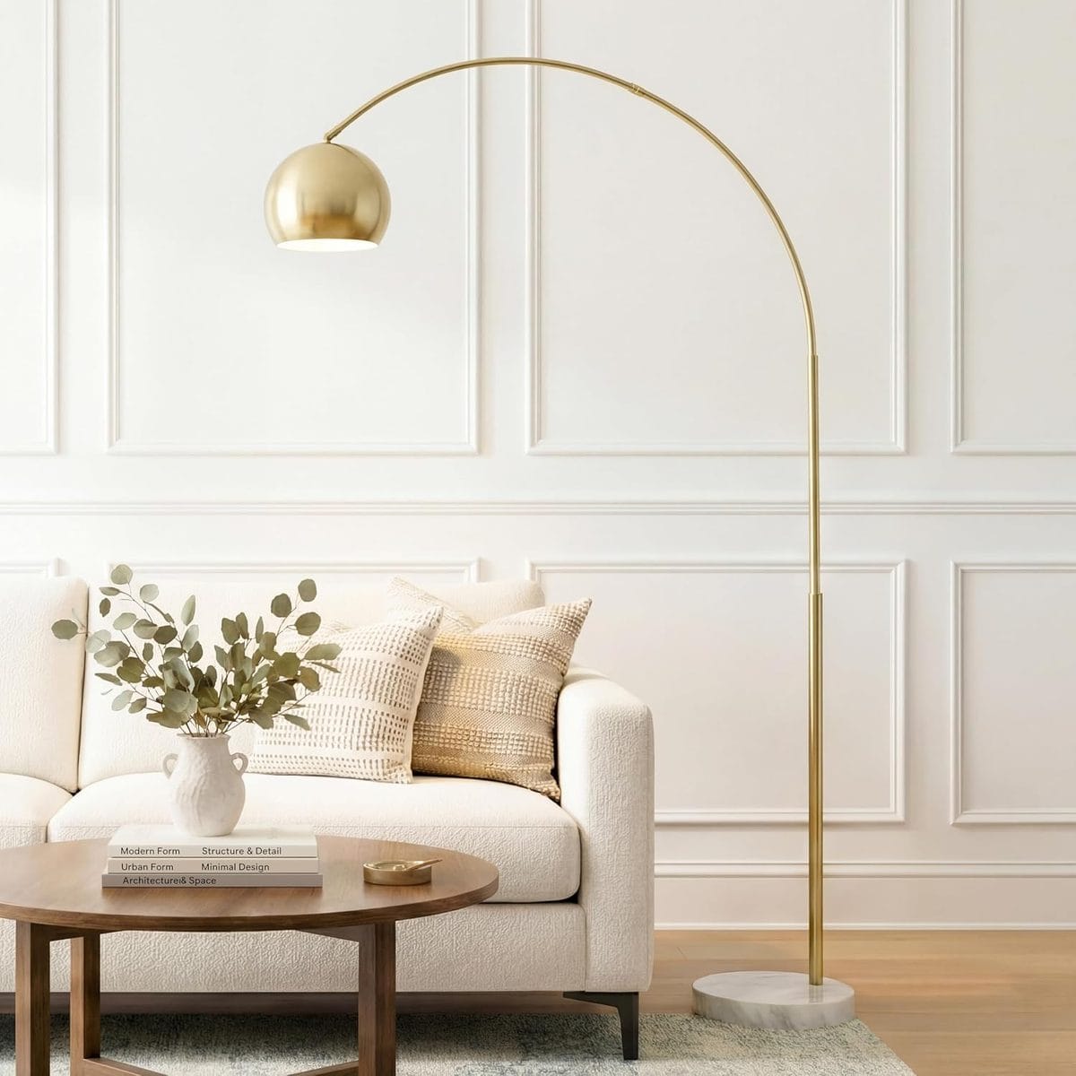 Brightech Olivia arc floor lamp with brass finish, globe shade and natural marble base