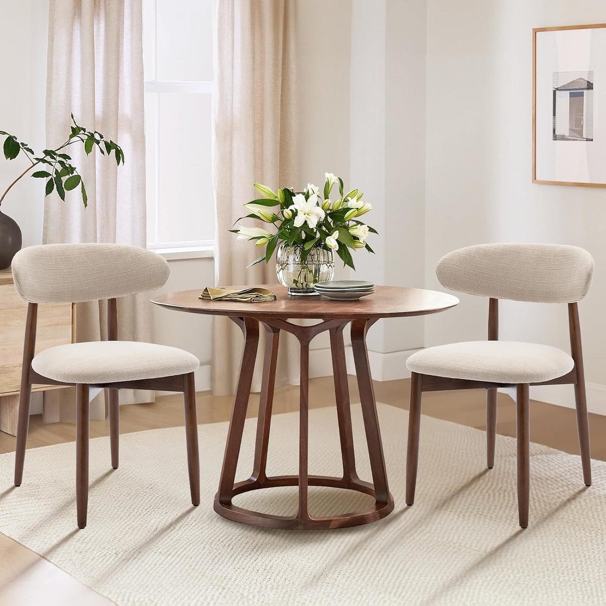 Two beige COLAMY upholstered dining chairs with curved backrests and wood legs