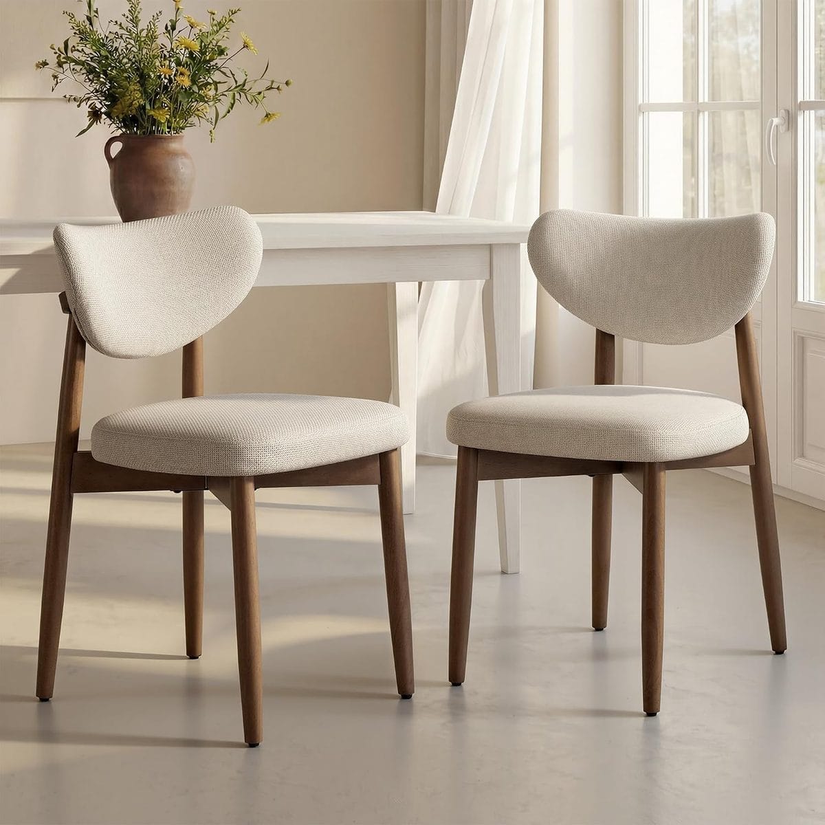 Two VASAGLE upholstered dining chairs with curved backs and tapered solid wood legs